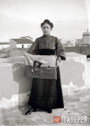 Münter on the Hotel Terrace in Tunisia with Her Beadwork “Volga Ships” 