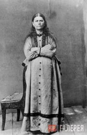 A cook posing for princess Sofia Alexeevna. End of 1870s